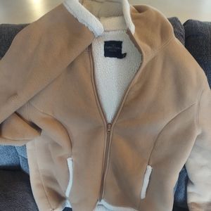Tan jacket with sherpa lining size L 12-14
